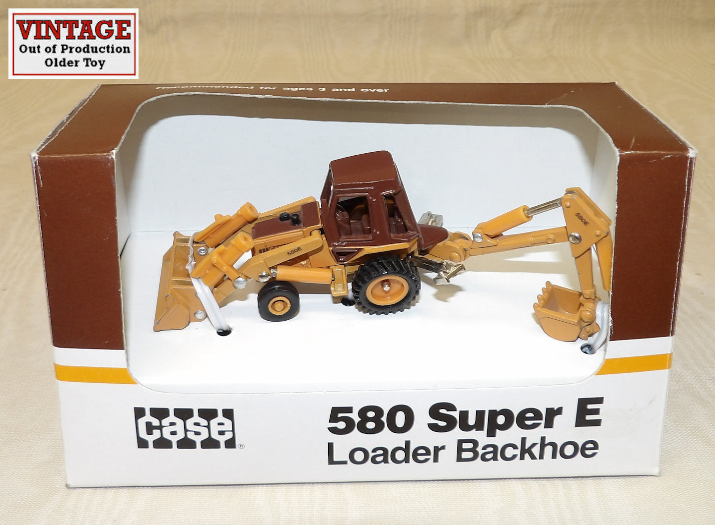 #202 1/64 Case 580 Super E Loader Backhoe