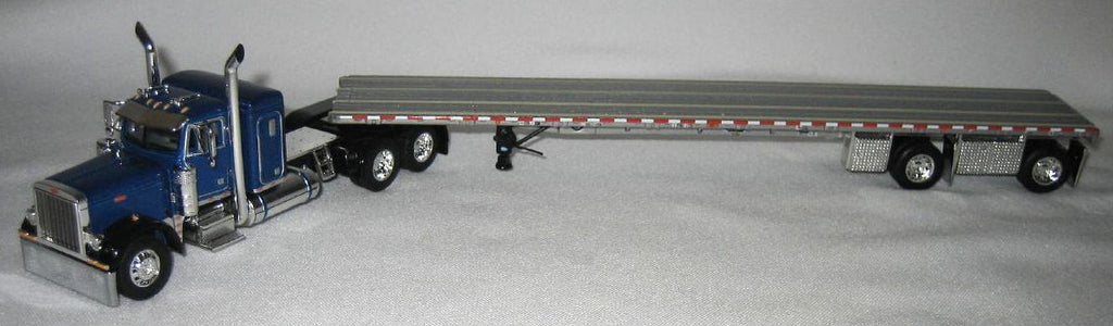 #60-1393 1/64 Blue & Black Peterbilt 379 36" Flattop Sleeper with Silver 53' Wilson Roadbrute Spread-Axle Flatbed Trailer