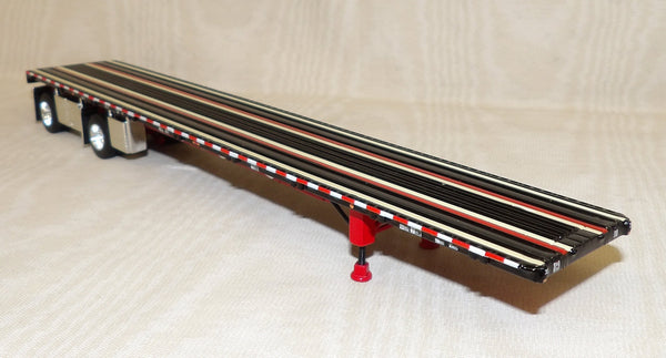 T184 1/64 Black Wilson 53' Road Brute Spread-Axle Flatbed