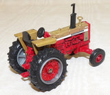 #14244A 1/64 International 1026 Gold Demostrator Tractor without Cab - No Package, AS IS