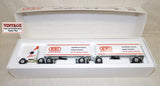 #2988EO 1/64  HWI Hardware Stores Volvo Cab with Pup Trailers, Limited Edition