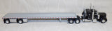 #30468 1/64 Black Peterbilt 379 with 36" Sleeper and Wilson Roadbrute Spread-Axle Flatbed Trailer