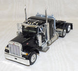 #30468 1/64 Black Peterbilt 379 with 36" Sleeper and Wilson Roadbrute Spread-Axle Flatbed Trailer