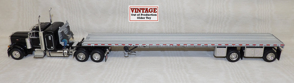 #30468 1/64 Black Peterbilt 379 with 36" Sleeper and Wilson Roadbrute Spread-Axle Flatbed Trailer