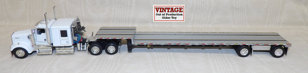 #30846 1/64 White Kenworth W900 with Transcraft Drop Deck Spread Axle Trailer