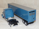 #32552 1/64 Werner Enterprises 379 Conventional Semi with Blue Coin Bank Trailer