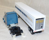 #32605 1/64 Werner Enterprises 379 Conventional Semi with White Reefer Coin Bank Trailer