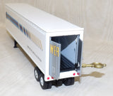 #32605 1/64 Werner Enterprises 379 Conventional Semi with White Reefer Coin Bank Trailer