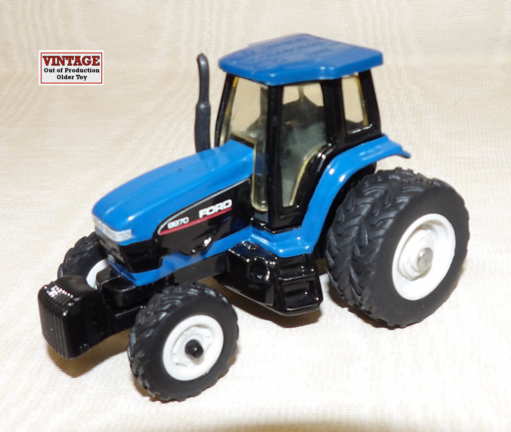 #394FA 1/64 Ford 8970 Genesis FWA Tractor with Duals 1995 Collector Edition