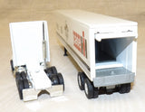 #438EO 1/64 J.I. Case White GMC Semi with 150 Years Case Logo Trailer