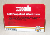 #4405EO 1/64 Case-IH 8840 Self-Propelled Windrower - Opened Packaging, AS IS