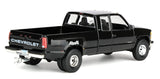 #51587-A 1/64 Black 1998 Chevrolet Silverado 3500 Extended Cab Dually Pickup with Black Vertical 3-Hole Gooseneck Livestock Trailer