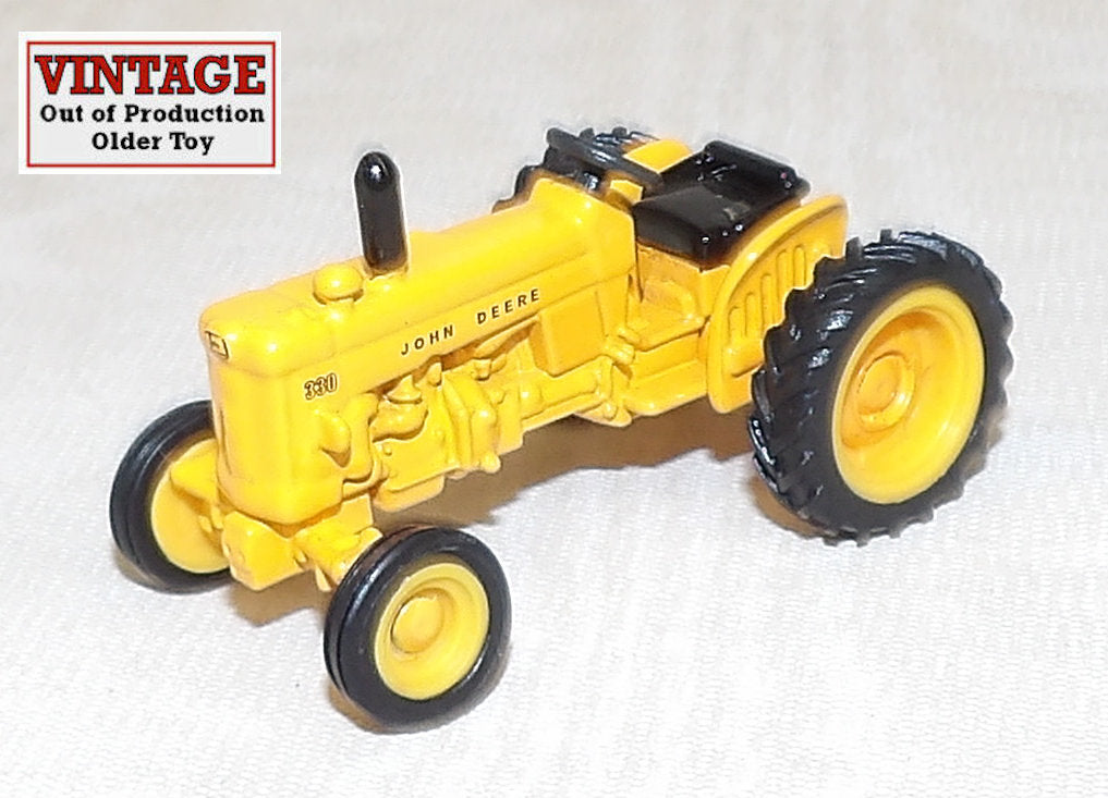 #57361 1/64 John Deere Model 330i Industrial Wide Front Tractor - No Package, AS IS