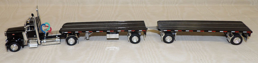 #60-1889 1/64 Black Peterbilt Model 379 Single Axle Day Cab with Dual 28.5' Utility Flatbed Trailers