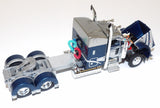 #60-1935 1/64 Rich Blue & Silver Peterbilt Model 389 with 48" Mid-Roof Sleeper & Talbert 5553T Traveling Axle Trailer