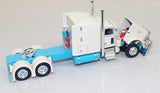 #60-2207 1/64 Capitola Trucking Peterbilt Model 389 with 63" Mid-Roof Sleeper & 43' Wilson Pacesetter High Sided Grain Trailer
