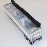 #60-2207 1/64 Capitola Trucking Peterbilt Model 389 with 63" Mid-Roof Sleeper & 43' Wilson Pacesetter High Sided Grain Trailer