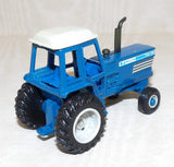 #832FO 1/64 Ford TW-35 Tractor - No Package