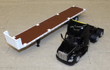 #84675 1/64 Black Peterbilt 579 with Flatbed Trailer, Cat 272D Skid Steer Loader & Pallet Boxes