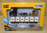 #84675 1/64 Black Peterbilt 579 with Flatbed Trailer, Cat 272D Skid Steer Loader & Pallet Boxes
