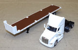 #84676 1/64 White Peterbilt 579 with Flatbed Trailer, Cat 272D Skid Steer Loader & Pallet Boxes
