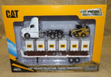 #84676 1/64 White Peterbilt 579 with Flatbed Trailer, Cat 272D Skid Steer Loader & Pallet Boxes
