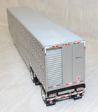 #60-2104 1/64 Harrison Trucking Peterbilt Model 379 with 63" Mid-Roof Sleeper & Wilson Silverstar Spread Axle Livestock Trailer